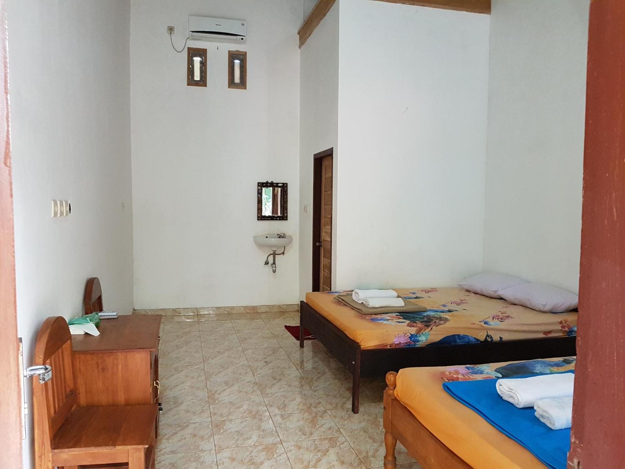 Red Island Bungalows Pasanggaran Номер фото